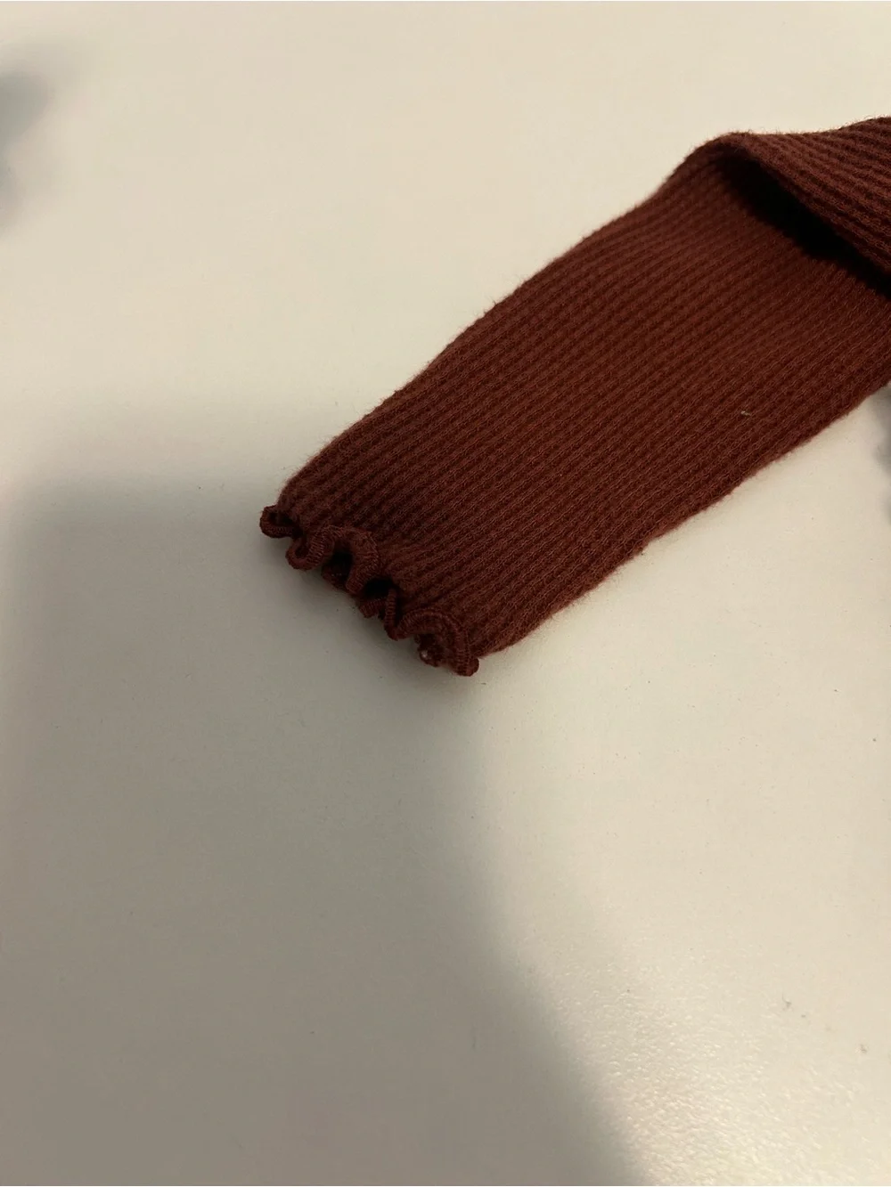 Rust Ruffle Neck Ribbed Baby Onesie